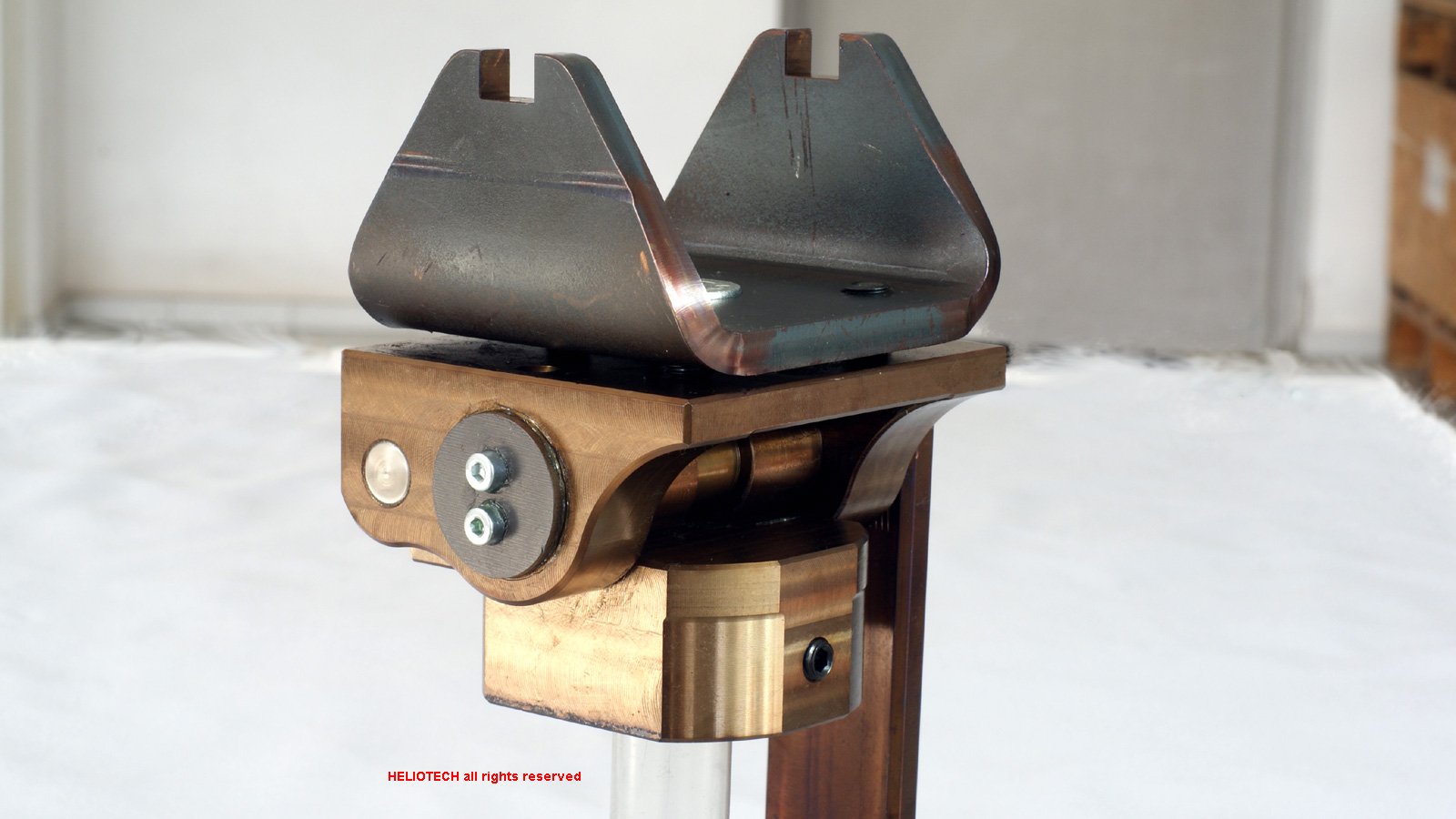 English wheel lower roller holder with visible detail of the quick-release anvil mechanism